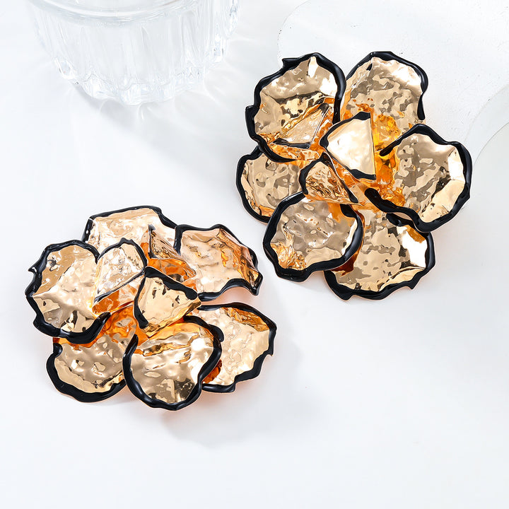 Elegante Blüten-Statement-Ohrringe in Gold und Schwarz